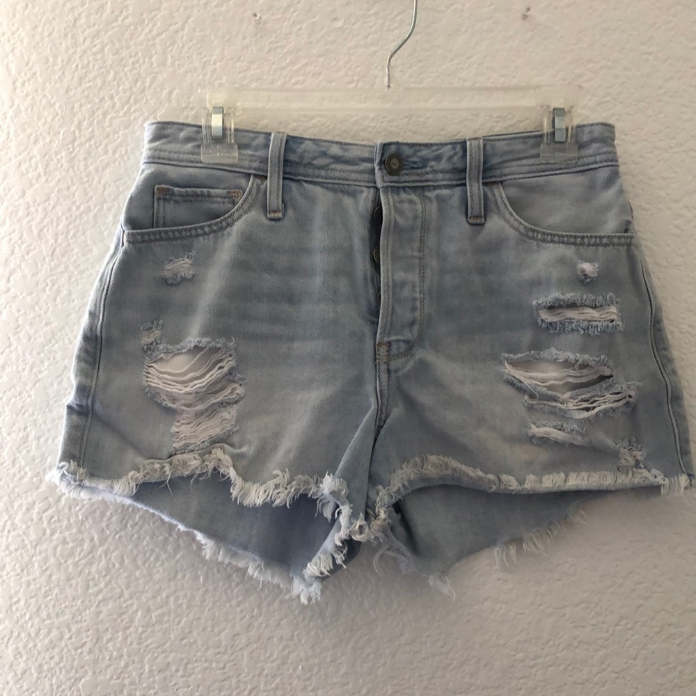 Light wash jean shorts.